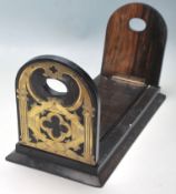 A 19TH CENTURY ROSEWOOD AND BRASS METAMORPHIC BOOK ENDS