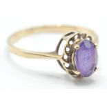 9CT GOLD PURPLE STONE LADIES RING