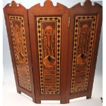 A 20th Century Sorrento ware marquetry triptych fire screen having geometric wooden panels with