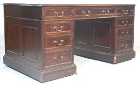 A 19th Century Victorian mahogany twin pedestal office desk of large proportions. Each pedestal