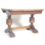 A mid 20th Century vintage oak draw leaf dining table having a shaped table top over baluster legs