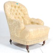 A 19TH CENTURY VICTORIAN BUTTON BACK ARMCHAIR / BE