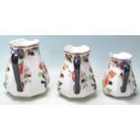 THREE GRADUATING VICTORIAN LOSOL WARE JUGS