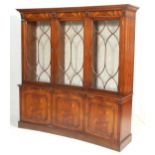 A 20TH CENTURY REGENCY REVIVAL INVERTED BOW FRONT BOOKCASE