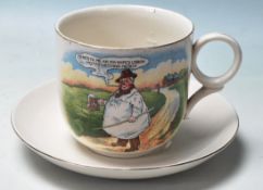 A large early 1900's Victorian Tykes Motto Teacup and Saucer, stamped 'Trade Mark Tyke B&K Ltd' to