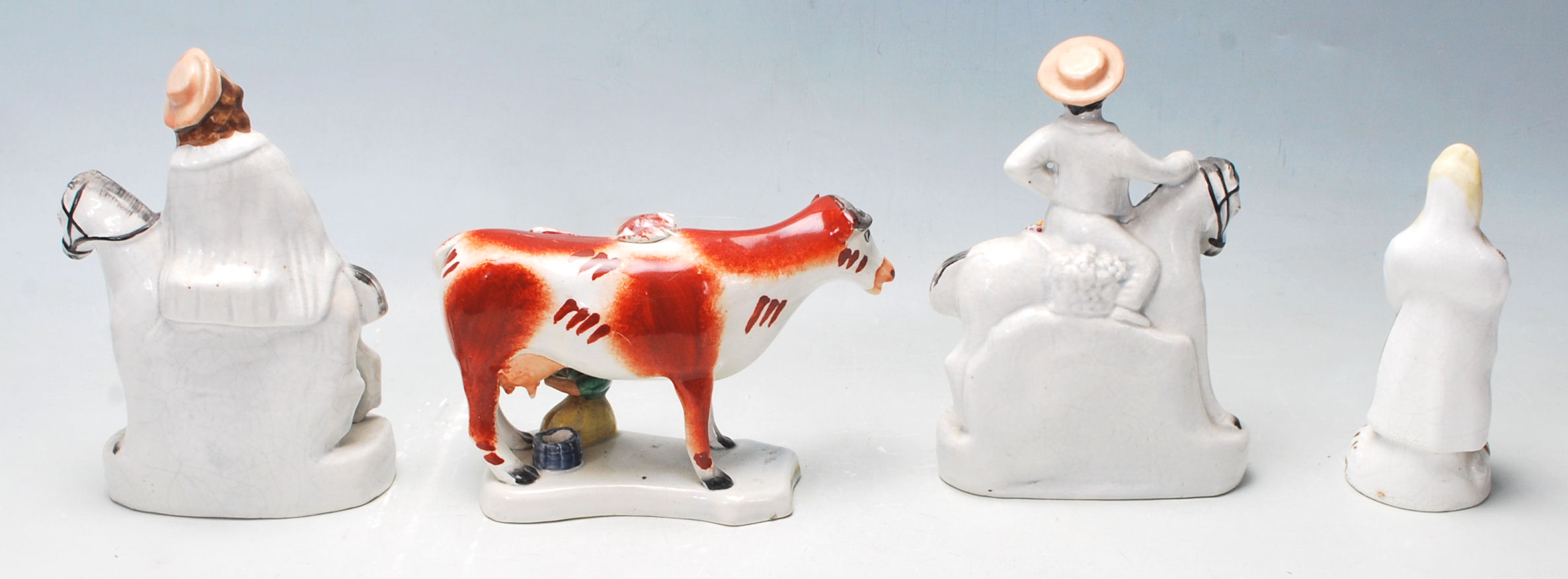 A group of four 19th century Victorian Staffordshire ceramic figurines to include a pair of his - Image 3 of 6