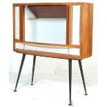 A RETRO MID 20TH CENTURY COCKTAIL CABINET.