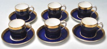 A collection of six early 20th century fine bone china by Mintons comprising of cups and saucers all