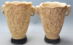 A pair of early 20th Century Chinese resin vases h