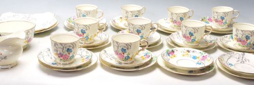 A COLLECTION OF TUSCAN FINE BONE CHINA