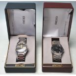 TWO GENTLEMAN'S VINTAGE STAINLESS STEEL WATCHES