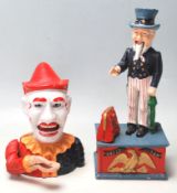 TWO 20TH CENTURY CAST IRON MONEY BOXES