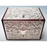 A vintage 20th century jewellery box with silver panels. The silver panels having embossed rococo