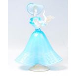 A vintage retro 20th century Murano studio art glass figurine of a lady. The bright coloured