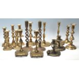 LARGE COLLECTION OF ANTIQUE CANDLESTICKS