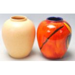 A PAIR OF VINTAGE POOL POTTERY VASES