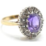 HALLMARKED 9CT GOLD DRESS RING SET WITH A LARGE PURPLE STONE