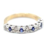 9CT GOLD BLUE AND WHITE STONE RING