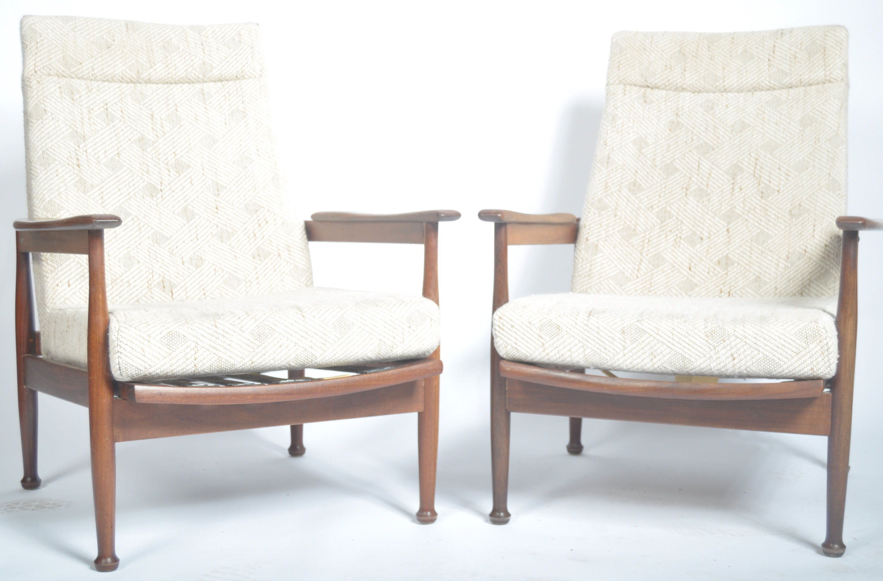 MATCHING PAIR OF TEAK FRAMED RECLINING LOW EASY ARMCHAIRS BY GREAVES AND THOMAS