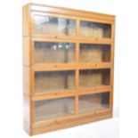 EARLY 20TH CENTURY FOUR SECTION LAWYERS STACKING BOOKCASE