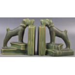 PAIR OF EARLY 20TH CENTURY ART DECO CERAMIC DOG BOOKENDS