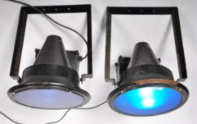 PAIR OF METAL CASED THEATER SPOTLIGHTS HAVING BLUE GLASS PANELS