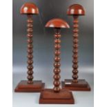 GROUP OF THREE MAHOGANY SHOP / HABERDASHERY HAT DISPLAY STANDS