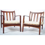 PAIR OF TOOTHILL AFROMOSIA WOOD ARMCHAIRS RETAILED BY HEALS