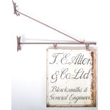 EARLY 20TH CENTURY CAST IRON DOUBLE SIDE ADVERTISING SIGN