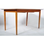 BELIEVED ALFRED COX FOR HEALS EXTENDING DINING TABLE