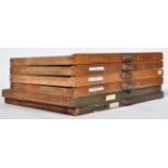 GOOD GROUP OF SIX EARLY 20TH CENTURY INDUSTRIAL MULTI SECTION DRAWERS