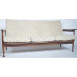 GREAVES AND THOMAS TEAK FRAMED THREE SEATER SOFA SETTEE BY GREAVES AND THOMAS