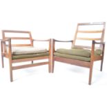 QUALITY PAIR OF HIS AND HERS TEAK FRAMED ARMCHAIRS / EASY LOUNGE CHAIRS