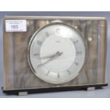 MID CENTURY CHROME AND LUCITE CLOCK BY METAMEC