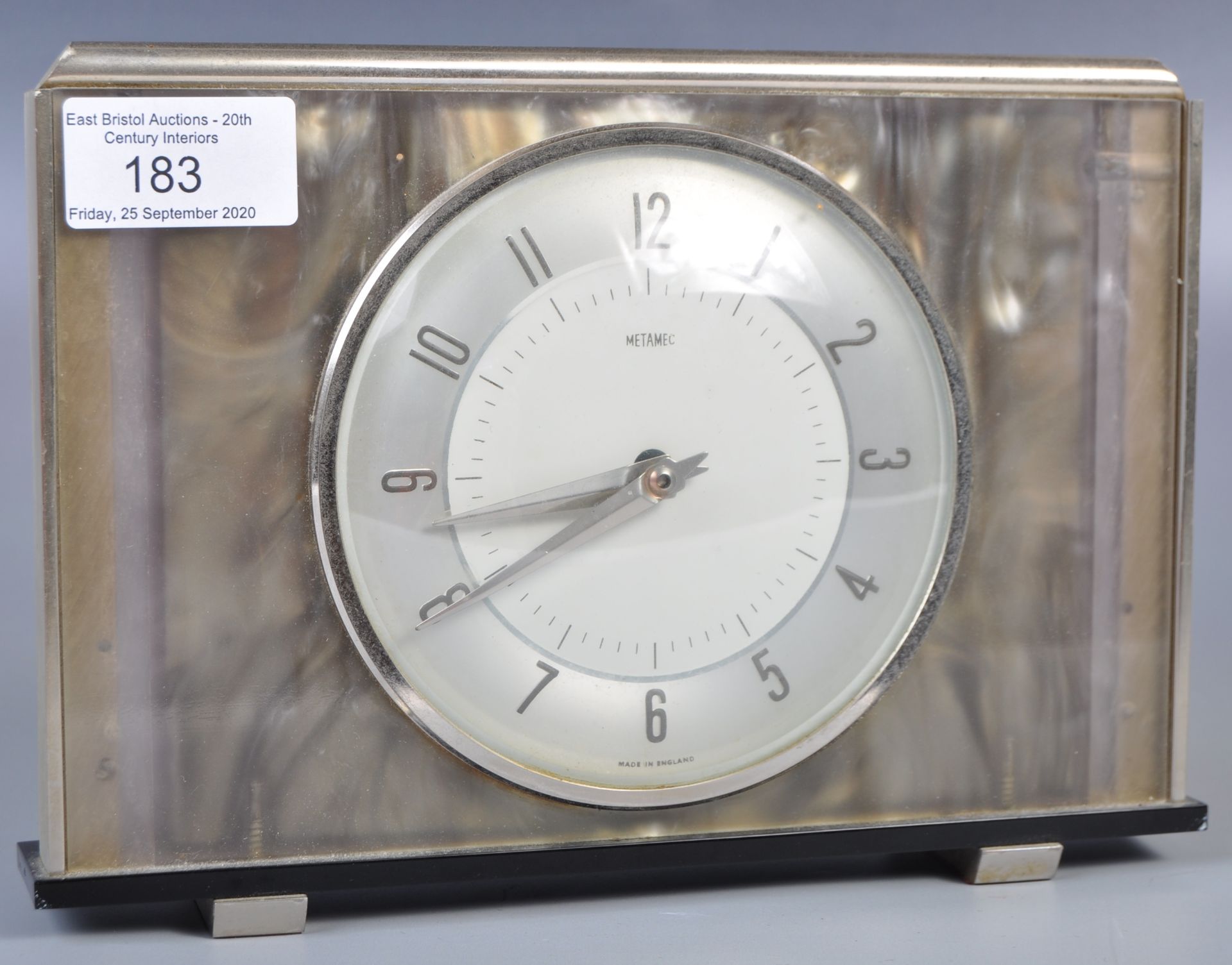 MID CENTURY CHROME AND LUCITE CLOCK BY METAMEC