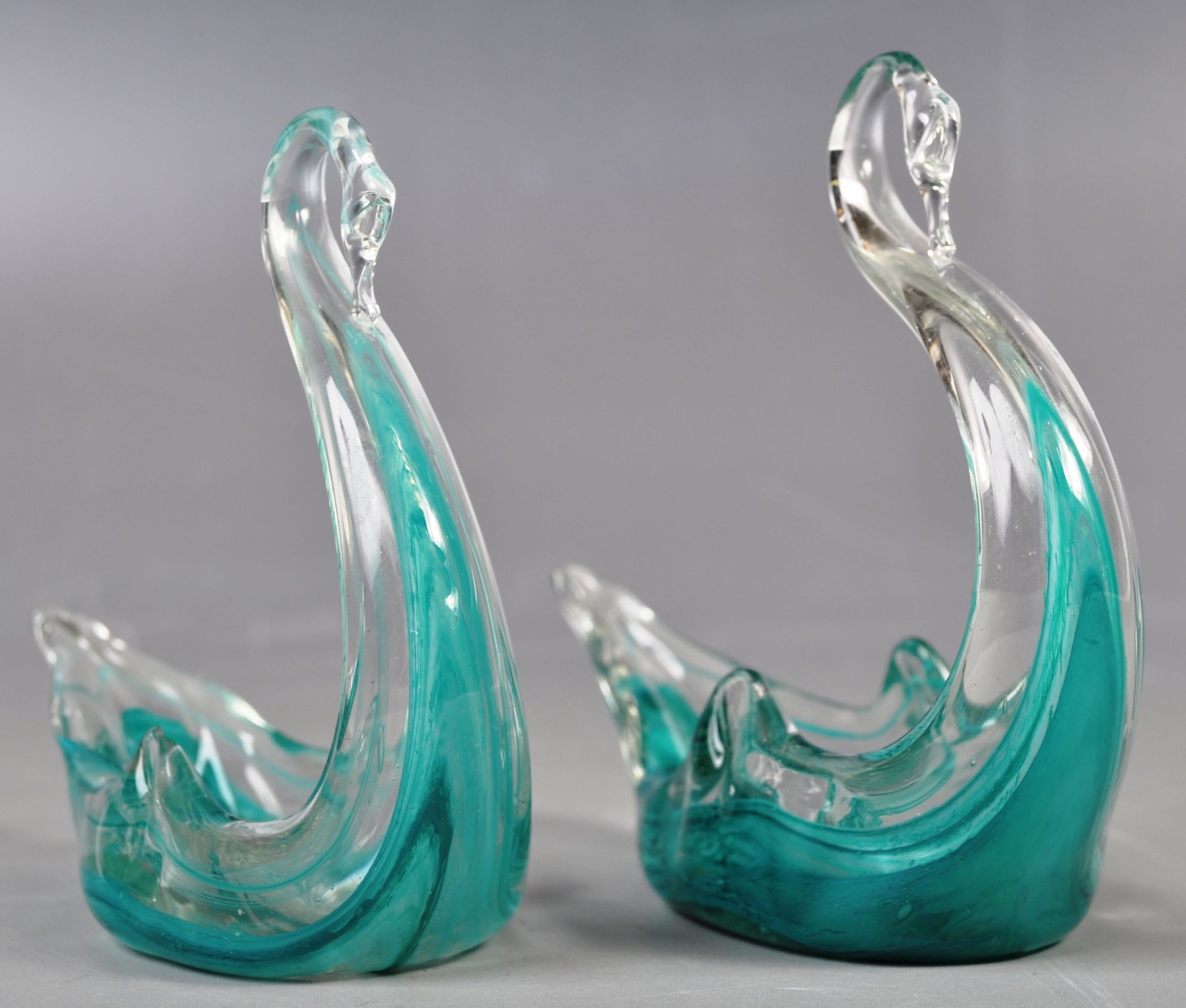 PAIR OF RETRO TURQUOISE GLASS TABLE SALTS / TRINKET DISHES IN THE FORMS OF SWANS