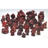 COLLECTION OF CHINESE RESIN CAST CINNABAR NETSUKE ETC