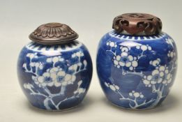 CHINESE BLUE AND WHITE GINGER JARS WITH PRUNUS DECORATION