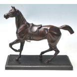 ANTIQUE 20TH CENTURY BRONZE RACING HORSE RAISED ON PLINTH BASE.