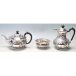 AN EDWARD VII SILVER TEA SET BY ATKIN BROTHERS SHEFFIELD DATED 1904 M