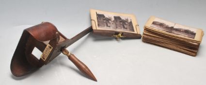 A LATE 19TH CENTURY VICTORIAN STEREOSCOPE VIEWER WITH SLIDES OF LONDON, BIRMINGHAM AND SOUTH AFRICA