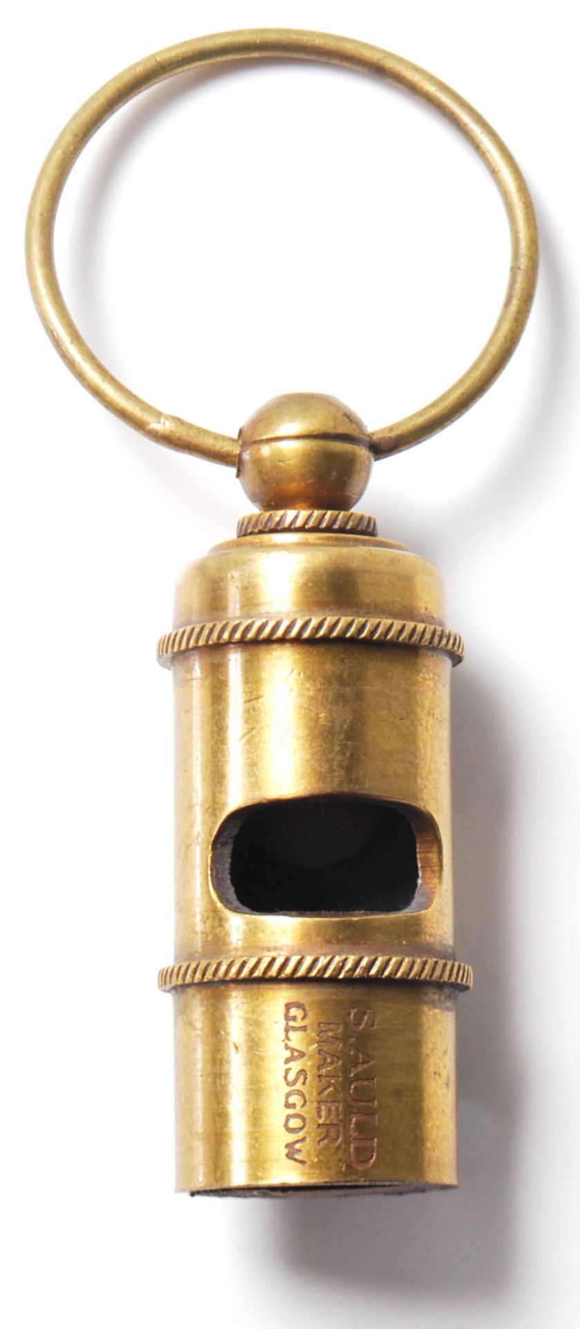AN INSCRIBED WHITE LINE STAR RMS TITANIC WHISTLE.