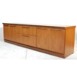 A RETRO DANISH INSPIRED LOW TEAK WOOD SIDEBOARD