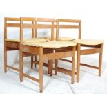 FOUR VINTAGE DANISH INSPIRED TEAK WOOD DINING CHAIRS