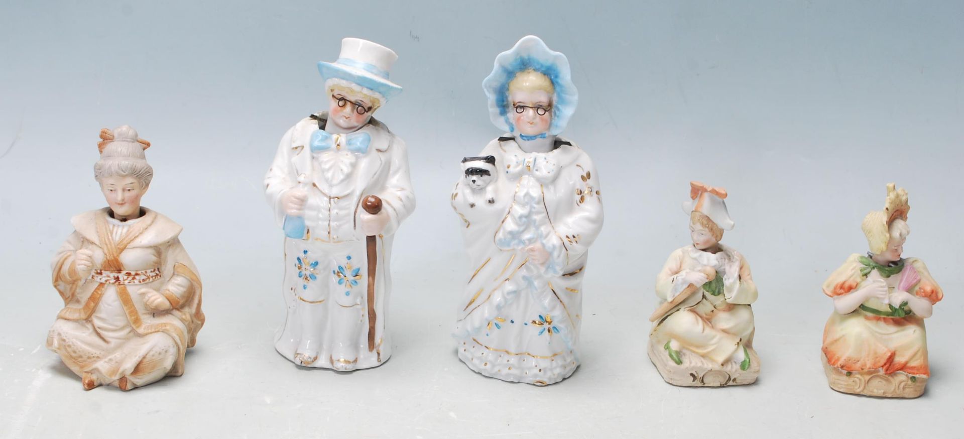 GROUP OF EDWARDIAN GERMAN NODDING PORCELAIN FIGURINES