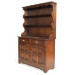 ANTIQUE STYLE OAK DRESSER IN THE MANNER OF OLD CHARM