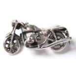 A STAMPED 925 SILVER BROOCH IN THE FORM OF A MOTORBIKE.