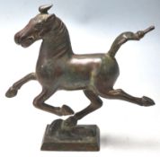 A 20TH CENTURY BRONSE BRASS CHINE FLYING HORSE OF GANSU