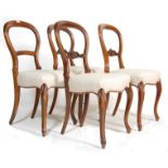 FOUR 19TH CENTURY VICTORIAN MAHOGANY BALLOON BACK CHAIRS.