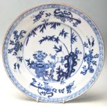 A CHINESE 19TH CENTURY BLUE & WHITE WALL CHARGER - PLATE